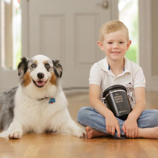 A happy dog and child